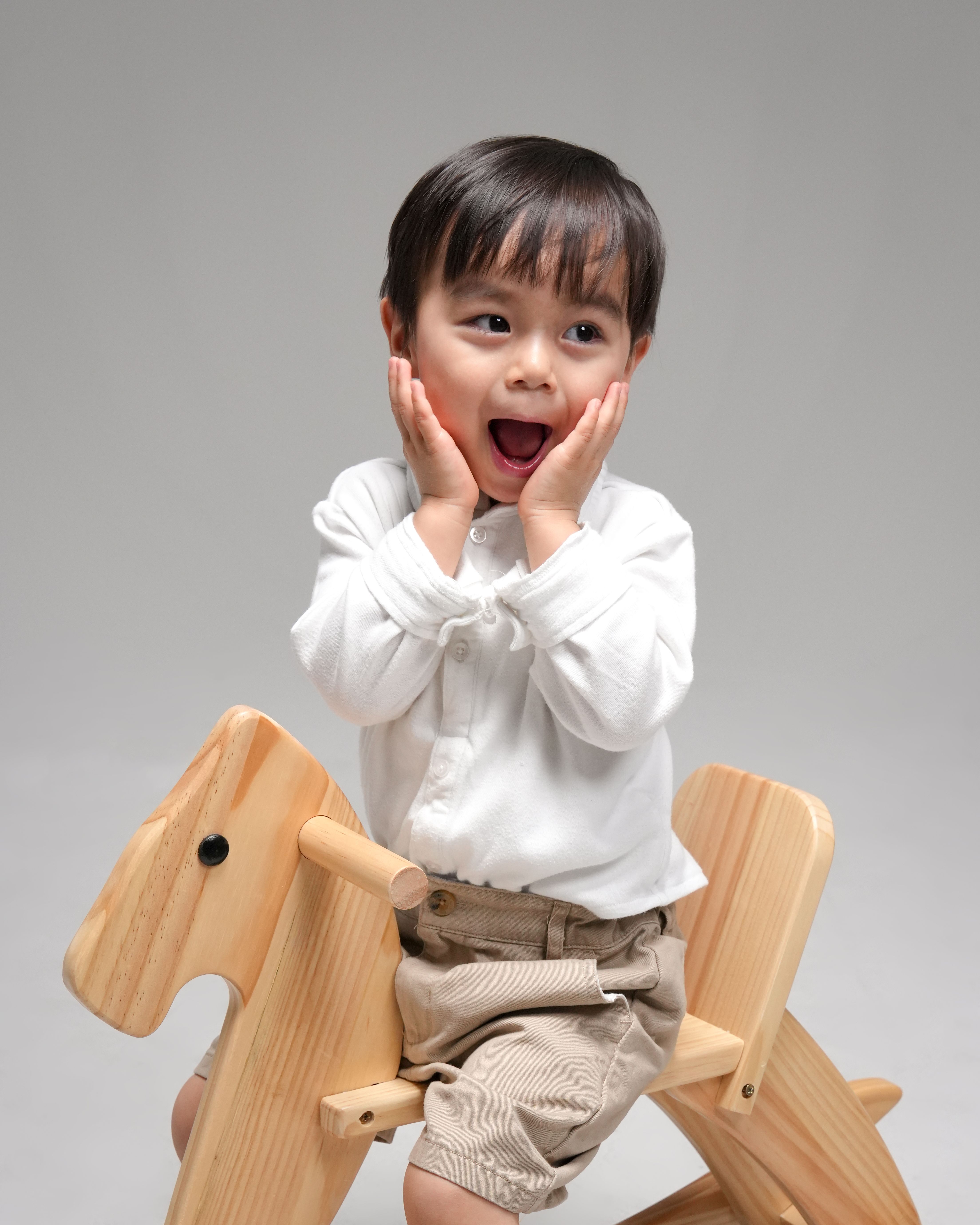 Toddler portrait on a rocking horse in Santa Clara, California