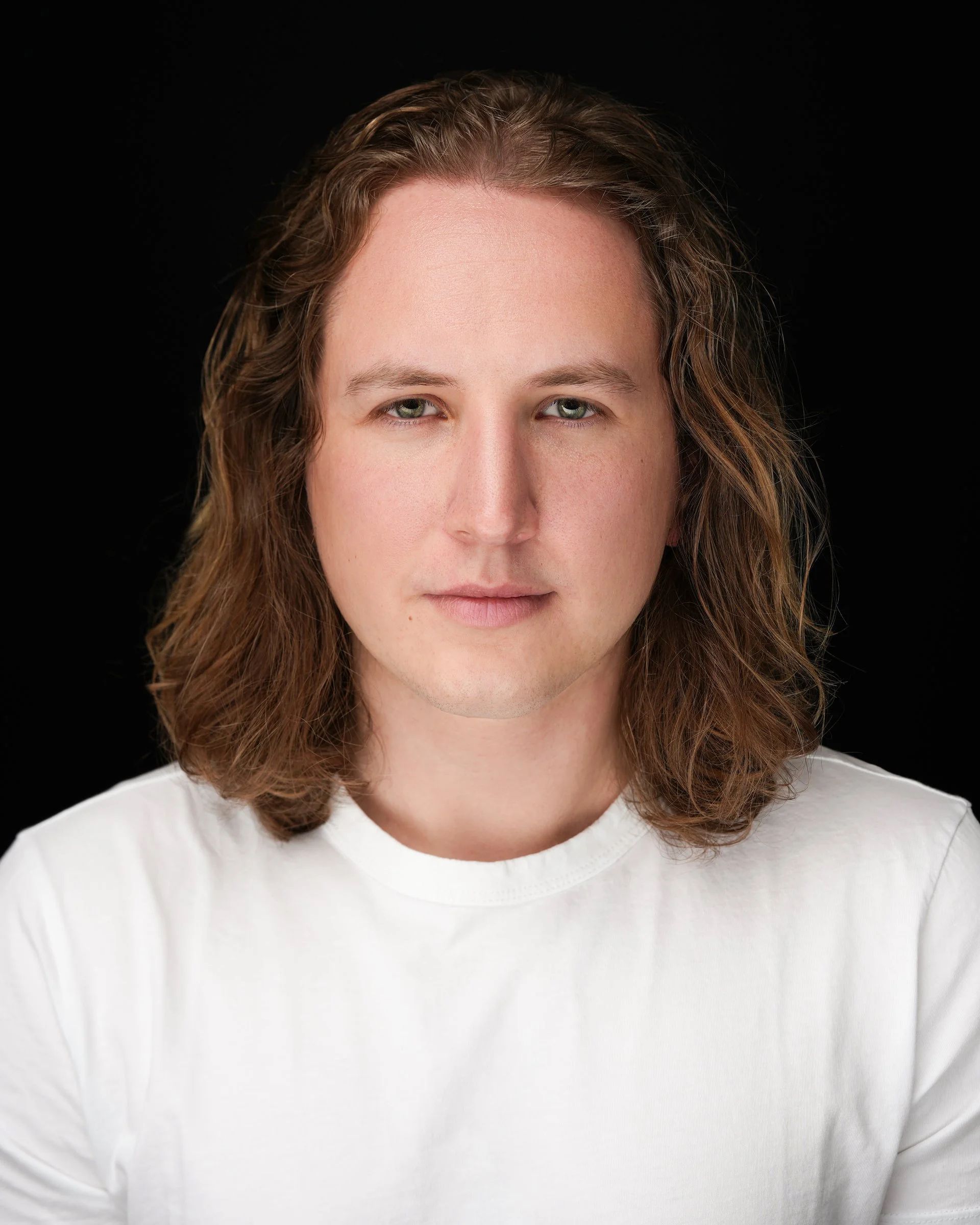 Professional men’s headshot at Pillar Point Harbor in Half Moon Bay, California.