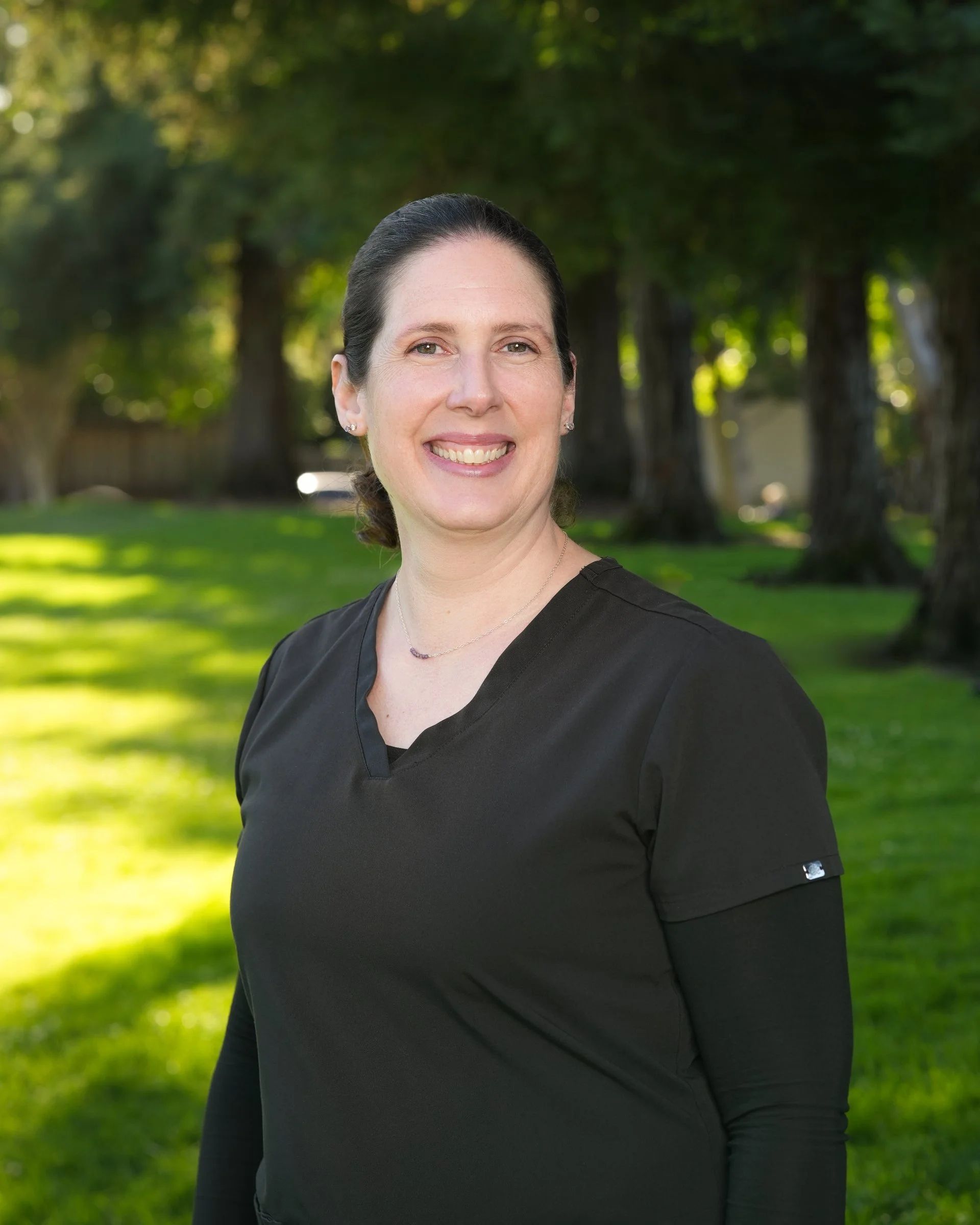 Outdoor headshot near Stevens Creek Boulevard in Cupertino, California by Pacifica Studio.