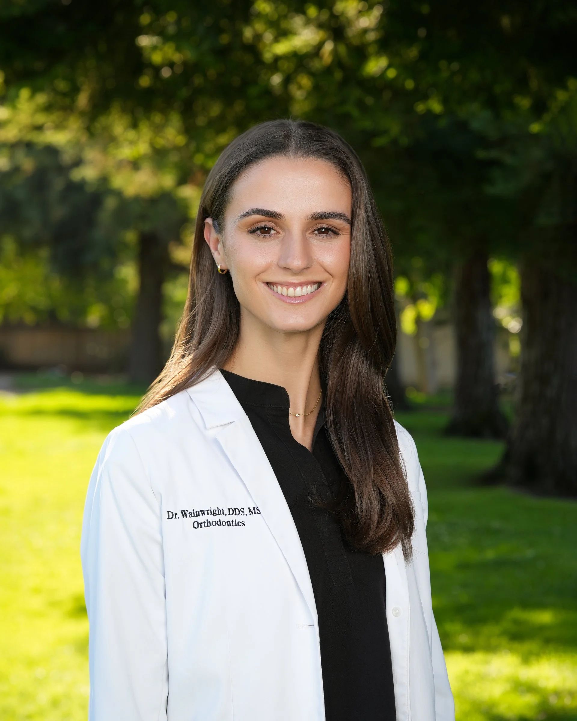 Outdoor headshot in the San Jose Municipal Rose Garden, California by Pacifica Studio.